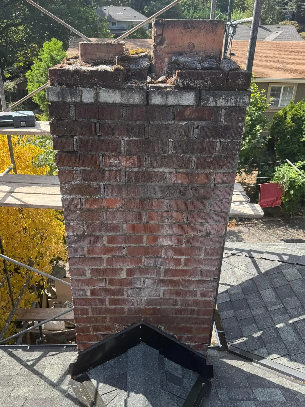 Deteriorated Brick & Crown → New Cap, Crown, Sealed & Flashed before